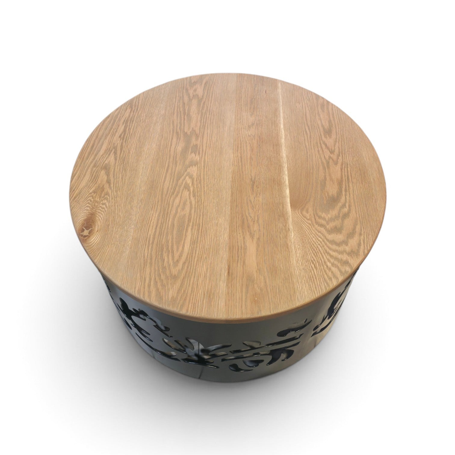 Coffee table with metal and oak top laser cut decorative leaves